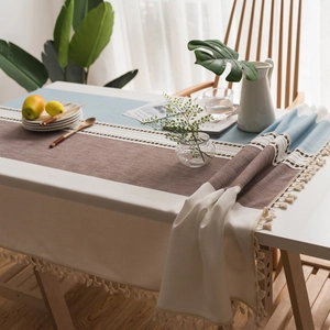 Nordic style color-block tablecloth with geometric embroidery and elegant cream fringe
