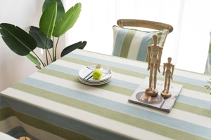 Detail of waterproof striped tablecloth and matching pillowcase with fabric texture