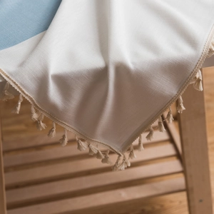 Nordic style linen tablecloth with blue embroidery and elegant tassel fringes