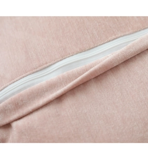 Pink faux wool cushion cover with hidden white zipper and soft corduroy texture
