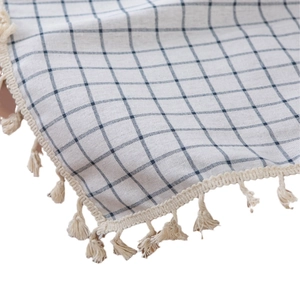 Mediterranean blue checkered cotton linen tablecloth with decorative fringe details