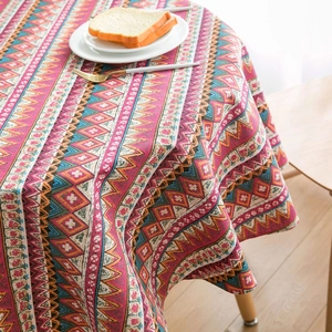 Detail of bohemian geometric pattern round tablecloth with colorful ethnic prints