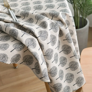 Detailed close-up of tree pattern on a premium cotton linen blend minimalist tablecloth