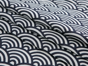Close-up of navy blue Seigaiha pattern on durable cotton linen fabric cover