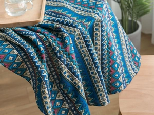 Close-up of Bohemian tablecloth showing thick cotton linen texture and blue geometric prints