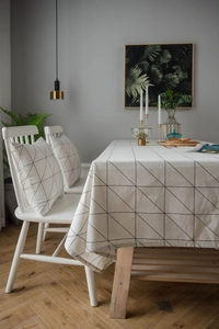 Close-up of minimalist black and white geometric pattern on cotton linen tablecloth texture