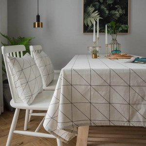 Modern minimalist black and white geometric tablecloth with matching linen pillows set
