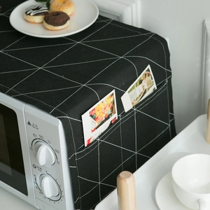 Black and white geometric dust cover for microwave with side storage pockets