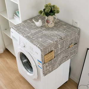 Vintage newspaper style dust cover for washing machine with handy side storage pockets