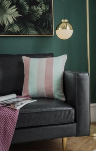 Detailed texture of modern striped decorative pillowcase in pink green and grey tones