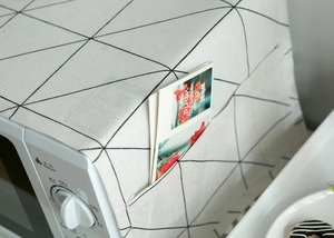 Nordic geometric dust cover with storage side pockets for microwave and oven