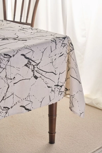 Close-up of modern white marble pattern table runner in linen fabric on wooden table