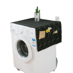 Modern black geometric washing machine dust cover with storage pockets and tassel trim