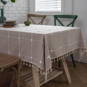 Linen rectangle tablecloth with white grid embroidery and decorative fringe trim