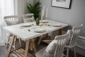 Detailed view of modern marble pattern place mat and matching chair cushion fabric