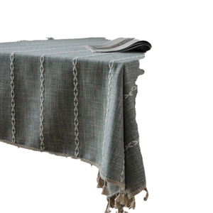 Dark grey green cotton linen tablecloth with white embroidery and brown tassel edges