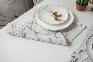 Close-up of marble pattern table runner with premium texture for dining room decor