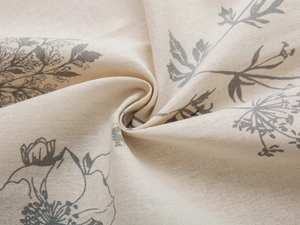 Detail of minimalist floral sketch print on soft cream fabric with linen texture