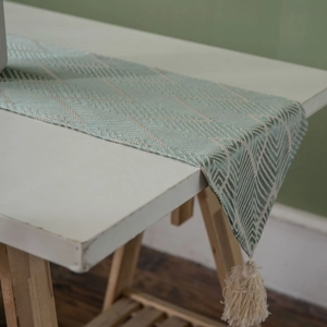 Nordic mint green and white geometric jacquard table runner with decorative tassels
