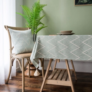 Navy blue jacquard waterproof tablecloth with green diamond patterns and elegant tassels
