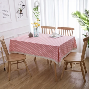 Pink cotton linen tablecloth with white heart patterns and elegant beige lace borders