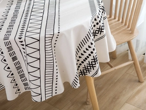 Detailed macro view of Bohemian black and white geometric pattern on cotton linen tablecloth