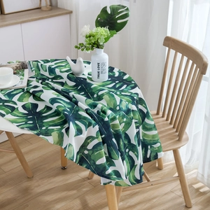Waterproof round tablecloth with green monstera leaf print in fresh nordic style