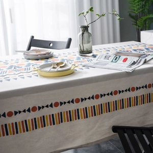 Bohemian geometric print tablecloth in cream with orange and blue patterns for home decor