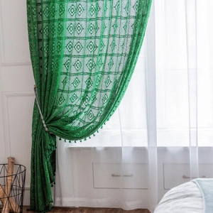Vintage green crochet curtain with hollow geometric floral patterns and tassel trim