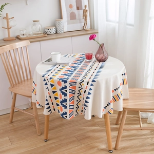 Nappe ronde géométrique bohème avec imprimés ethniques orange et bleu pour décoration
