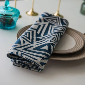 Nordic navy blue and cream jacquard table runner with geometric triangle patterns