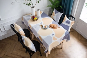 Detail view of Morandi geometric tablecloth and matching cushion set in Nordic style