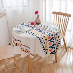 Nappe ronde bohème avec motifs géométriques et franges sur tissu en coton et lin crème