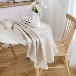 Linen cotton tablecloth with daisy print and elegant white lace edge for round table