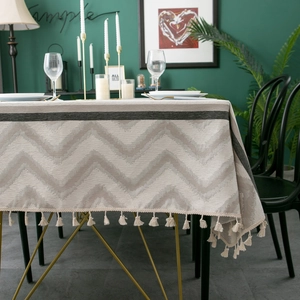 Modern chenille jacquard tablecloth with grey wave patterns and elegant fringe tassels