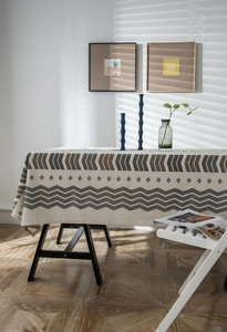 Detail of bohemian geometric pattern on thick cotton linen tablecloth for dining room