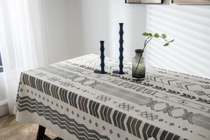Close-up of bohemian geometric patterns on high-quality cotton linen tablecloth fabric