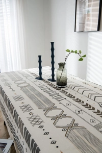 Detailed close-up of Bohemian geometric cotton linen tablecloth with ethnic patterns