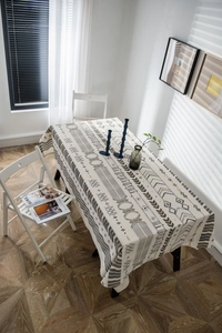 Detail of geometric pattern on cotton linen tablecloth with bohemian style motifs