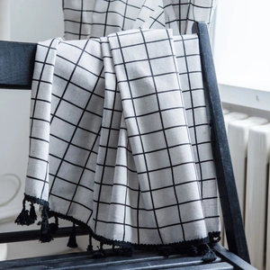 Minimalist white checkered window curtain with black grid print and elegant fringe tassels