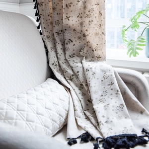 Beige cotton linen curtain with brown floral dragonfly print and black tassel trim