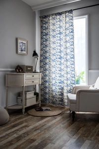 Blue and white floral toile cotton linen curtain detail with vintage tassel fringe edge