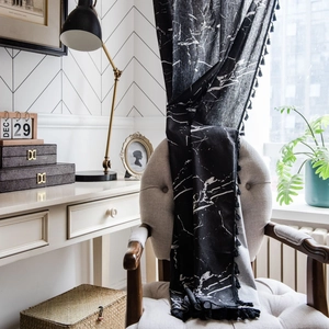 Black marble print curtains with decorative tassels for a Nordic minimalist home decor