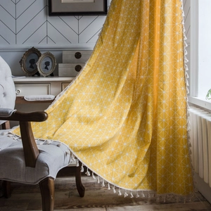 Yellow geometric boho curtain with tassels and white patterns for home decoration