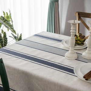 Japanese style linen tablecloth with blue stripes on a neutral beige cotton fabric