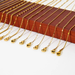 Golden stainless steel chain necklaces set featuring diverse link styles and lobster clasps