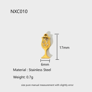 Detailed spec view of a gold wine glass pendant with white crystals and measurements