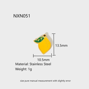 Detail view of lemon fruit charm in yellow enamel stainless steel with size dimensions