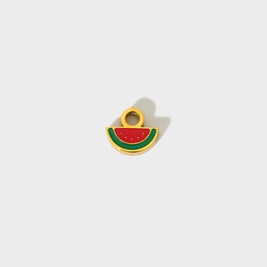 Watermelon shaped enamel pendant in gold finish with vibrant red and green colors