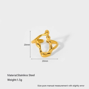Detail of 18K gold plated stainless steel ring with irregular hollow lava texture